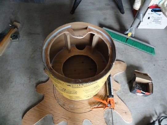 Both sonotube sections attached to the plywood frame